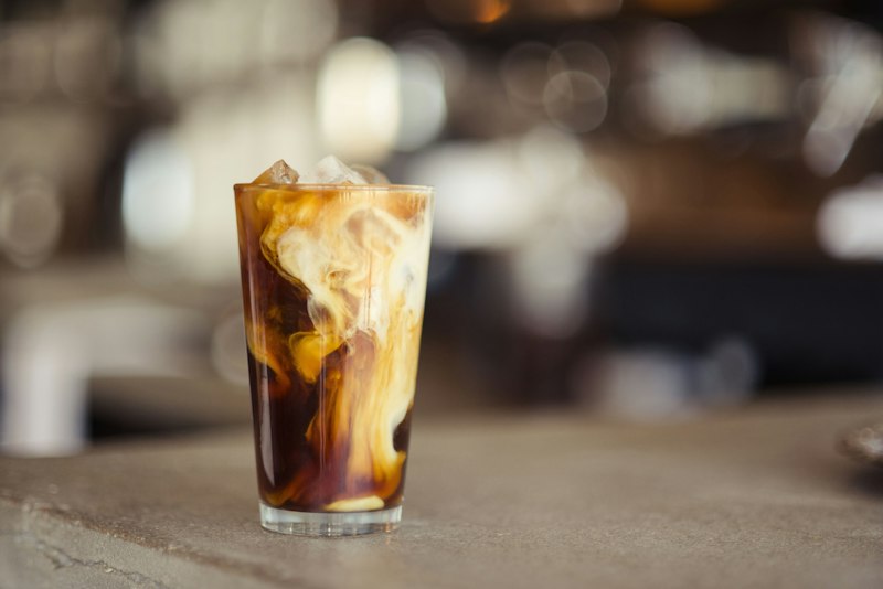 Iced latte in tall glass